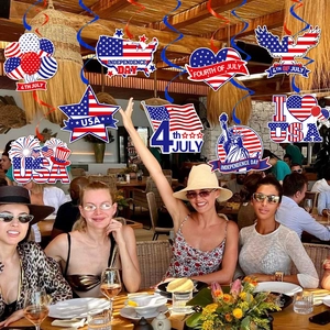 American Independence Day party decorations with red and blue foil swirls and USA themed cards