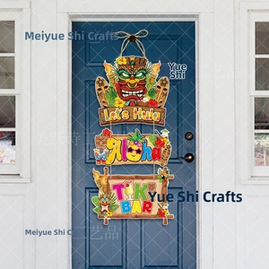 Close-up of three-tier wooden Hawaii Tiki hanging banner with Let's Hula and Aloha text