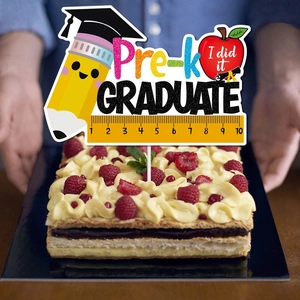 Colorful Pre-K Graduate cake topper featuring pencil and apple for graduation party decor