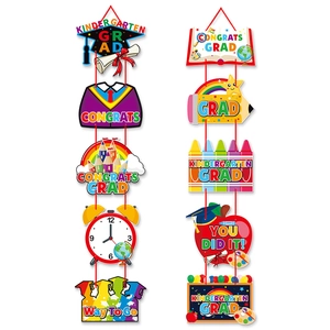 Colorful Kindergarten Grad door banners with cartoon motifs and congrats messages