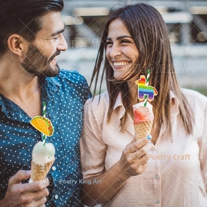 Outdoor lifestyle shot of colorful Mexican fiesta party paper straws with taco cartoon toppers
