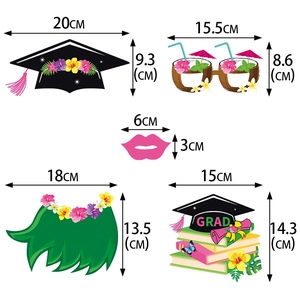 Hawaiian graduation party photo props with tropical flowers and graduation cap designs
