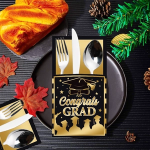 Congrats GRAD graduation party cutlery holder with black and gold theme decorations