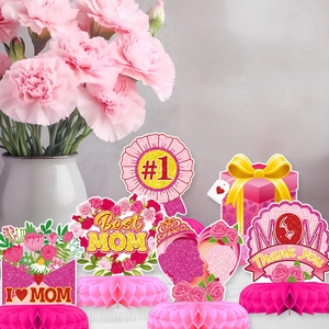 Pink and gold Mother's Day honeycomb centerpieces with floral and heart designs