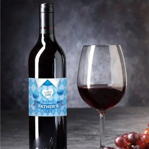 Father's Day wine bottle label featuring blue diamond pattern and festive greetings