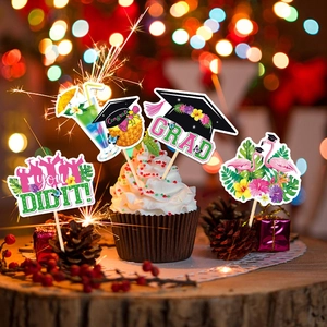 Hawaiian graduation cake toppers with flamingo and pineapple on cupcakes