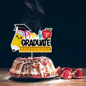 Pre-K Graduate cake topper featuring pencil, apple and ruler for preschool graduation