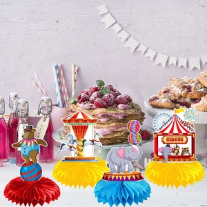 Detailed view of circus themed honeycomb centerpieces featuring an elephant and carousel