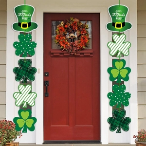 St. Patrick's Day welcome banners featuring green clover and hat designs on a red door
