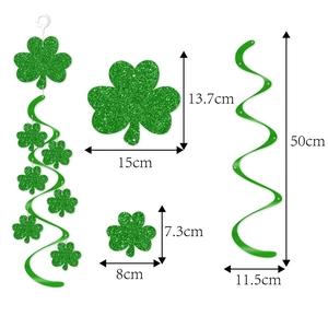 Green glitter shamrock spiral swirl decorations for St. Patrick's Day celebration
