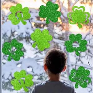 Glittery green shamrock window stickers with Lucky lettering for St. Patrick's Day decor