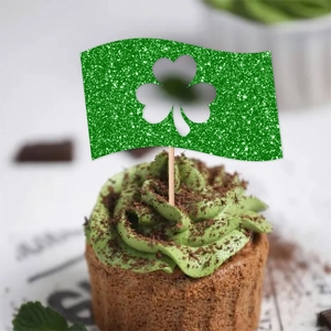Glittery green shamrock cupcake topper for St. Patrick's Day party dessert decoration