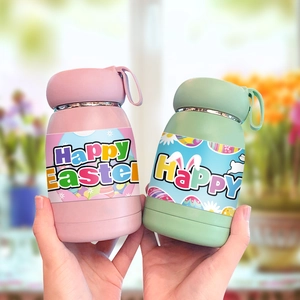 Pink and green mini Easter thermal bottles with rabbit ears and Happy Easter prints