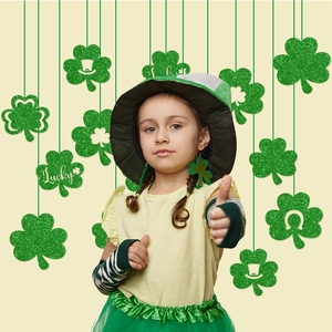 Saint Patrick's Day outfit set for girls featuring green clover hanging decorations and tutu