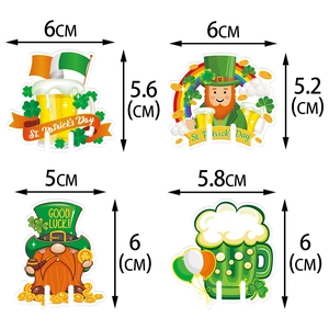 St. Patrick's Day glass card decorations with shamrocks and leprechaun designs