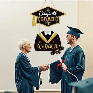 Black and gold graduation hanging door sign with Congrats Grad and We Did It text