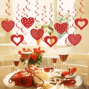 Red glitter heart spiral hanging decorations for Valentine's Day party venue backdrop