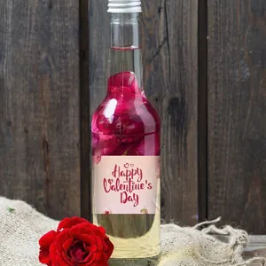 Romantic Valentine bottle stickers with rose petals on a glass bottle for party decor