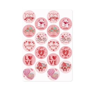 Detail of 20 round Valentine's Day stickers with hearts, love letters and gnomes patterns