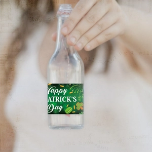 St. Patrick's Day water bottle label with clover pattern and green festive branding