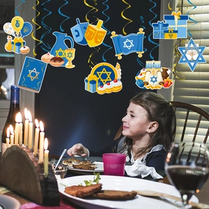 Hanukkah party ceiling decorations featuring blue gold swirls and traditional Jewish icons