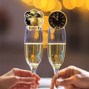 New Year party wine glass card markers with black and gold clock and balloon designs