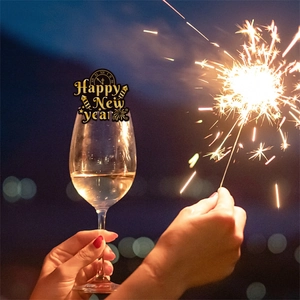 Elegant black and gold Happy New Year wine glass card decorations with fireworks