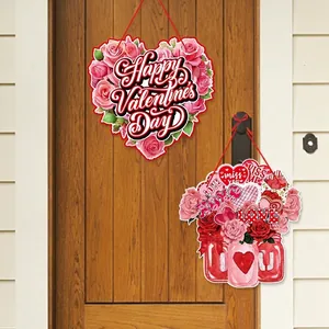 Valentine's Day heart wreath and floral door hangers on a rustic dark wooden door