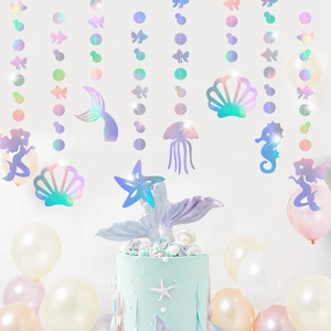 Iridescent mermaid garland featuring shells and seahorses for ocean party decorations