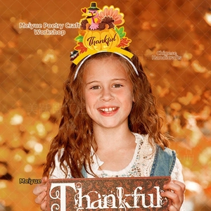 Detail of Thanksgiving headband with colorful turkey pumpkin and thankful text on child