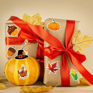 Thanksgiving turkey and maple leaf stickers set on gift boxes and autumn pumpkins