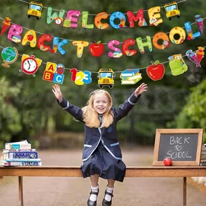 Welcome Back to School Papierbanner mit bunten Schulbus- und Schreibwarensymbolen