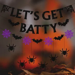 Halloween Let's Get Batty banner with black glitter bats and purple spider web decor