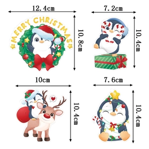 Set of four cute cartoon Christmas penguin hanging tags for winter party tree decorations