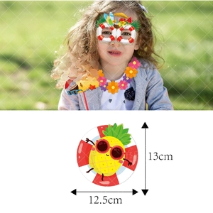 Detail of Hawaii pool party photo props showing pineapple ring size and summer time sign