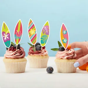 Tropical surfboard cupcake toppers with floral patterns for summer party cake decoration