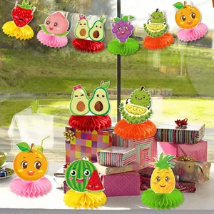 Detail of 3D honeycomb paper fruit decorations including pineapple and watermelon