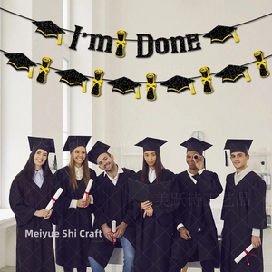 Glittery I'm Done letter banner with graduation cap and scroll decor for party backdrop