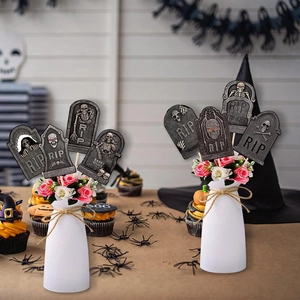 Halloween tombstone floral picks set featuring RIP skulls and spiders for party decor