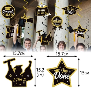 Graduation party decorations with black and gold hanging swirls and glitter cardstock sets