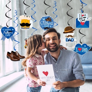 Father's Day hanging spiral decorations with blue beer and mustache cards in home setting