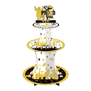 Three-tier black and gold graduation cupcake stand with So Proud of You topper and stars