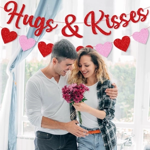 Glittering Hugs & Kisses banner with red and pink hearts for Valentine party decor