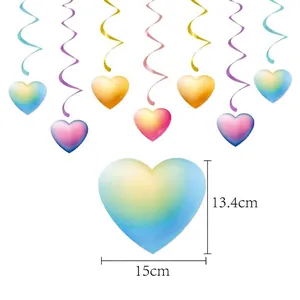 Macro detail of heart hanging decor measuring 15cm with colorful gradient spiral pendant