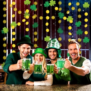 St. Patrick's Day shamrock hanging decorations with gold sequins for party venue decor