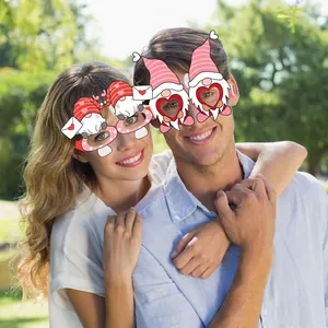Gnome themed Valentine party paper glasses with heart and envelope patterns for couples