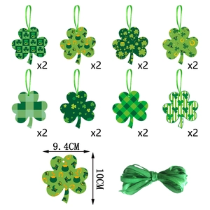 16-piece St. Patrick's Day clover paper ornaments with green ribbon for party decor