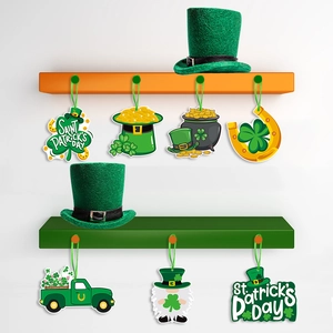 Green St. Patrick's Day wooden hanging ornaments set with shamrocks and gold coins
