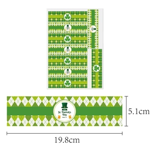 Green St. Patrick's Day water bottle labels with shamrock patterns and size details