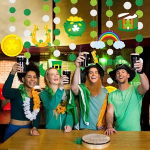 St. Patrick's Day party decorations set with green shamrocks, gold coins and lucky hats